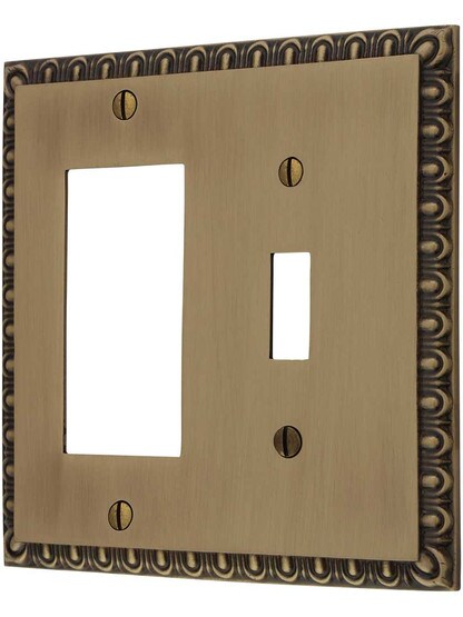 Ovolo Toggle/GFI Combination Switch Plate in Antique Brass.